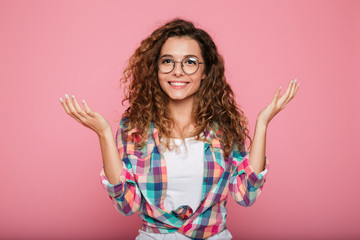 Cheerful lady wearing eyeglasses looking camera and smiling