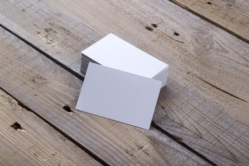 Business cards isolated on old wood background