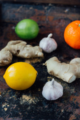 Citrus fruits with garlic and ginger root