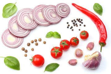 slice of tomato with chili pepper, garlic and parsley isolated on white background. top view