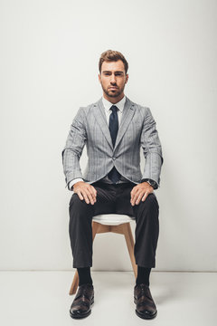 Businessman Sitting On Chair