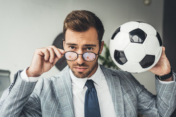 businessman with soccer ball