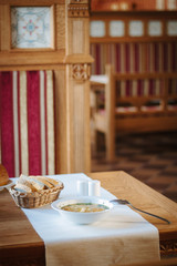 Nice vegetable soup at the table of restaurant.