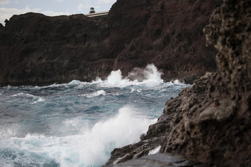 Fototapeta na wymiar cliffs with crashing waves