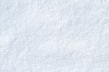 Fototapeta premium Background of fresh snow texture in blue tone. Copyspace for text