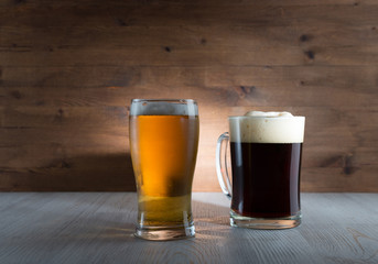 Two glasses of different colored beer