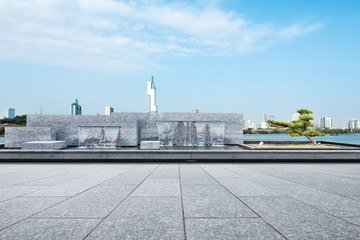 Fototapeta premium empty marble floor with decorative waterfall