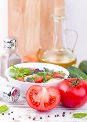 Salad. Tomatoes, cucumbers and onion.