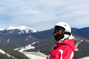 Fototapeta na wymiar skier standing on top of a mountain