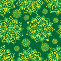 Yellow mandalas on a green background