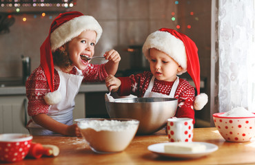 happy children bake christmas cookies.