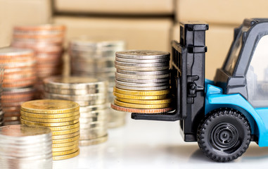 Coins stacked on the forklift truck.