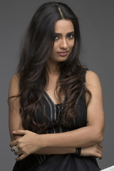 Portrait of beautiful Indian woman wearing black dress