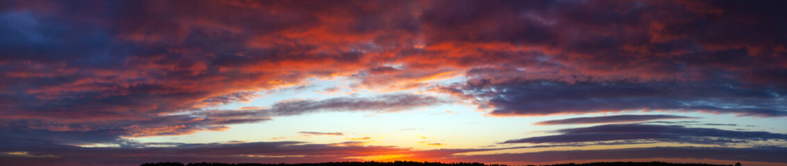  landscape panorama with blue sky, clouds and sunset.