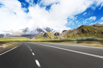 empty asphalt road with beautiful snow mountain