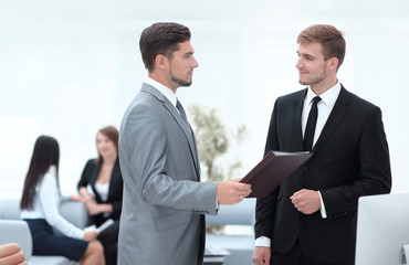 Manager conveys to the employee the documents in the office