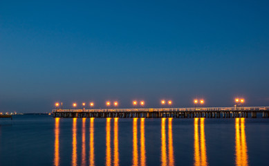 Obraz premium Baltic pier in Gdynia Orlowo at night, Pomorze, Poland