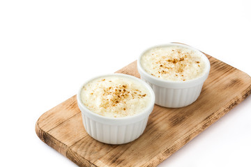 Arroz con leche. Rice pudding with cinnamon isolated on white background
