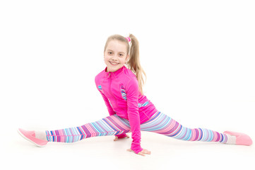 Child in pink sportswear.