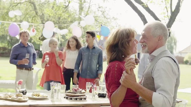 Family celebration or a garden party outside in the backyard.