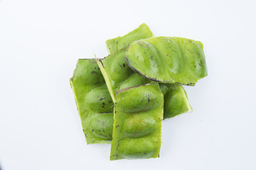 stinking-beans on white background. Also known as Petai in Melaysian and Indonesia, both for the practice of health food