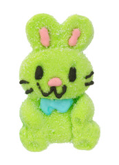 A green marshmallow candy Easter bunny with black whiskers isolated on a white background.