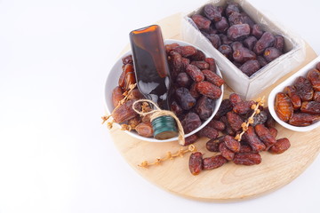 Close up concept of dried Dates and Dates concentrate on isolated white background.