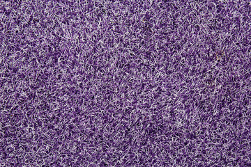 Artificial violet mat plastic fibers detail