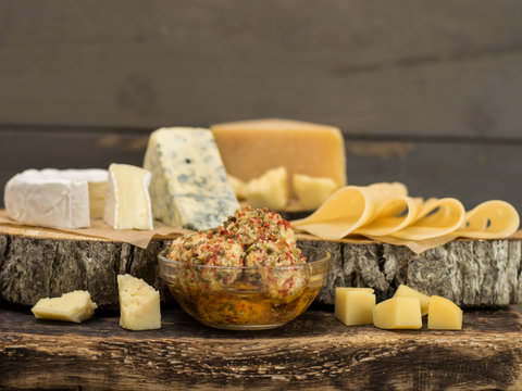 Cheese on a wooden table. 