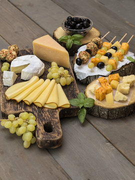 Cheese on a wooden table. 