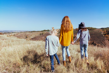 Happy family - mom and two daughters