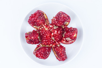 Close up/macro Pomegranates are traditional herbs on isolated white background. Either to make a nutritious drink juice