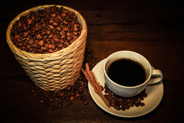 Hot coffee with coffee beans bucket