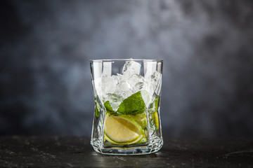 Mojito cocktail on dark background