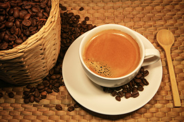 Hot coffee with coffee beans bucket