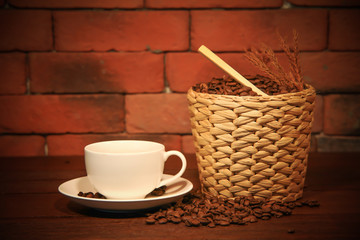 Hot coffee with coffee beans bucket