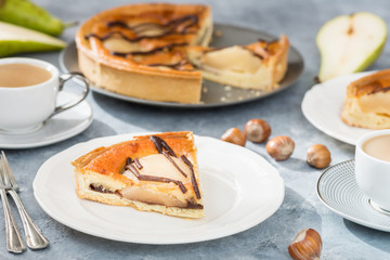 Table set for dessert with pear pie