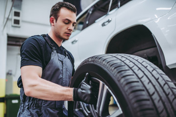 Handsome auto service mechanic