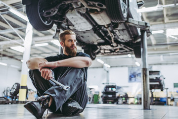 Handsome auto service mechanic