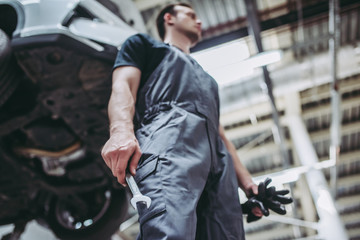 Fototapeta premium Handsome auto service mechanic