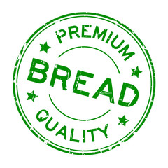 Grunge green premium quality bread round rubber seal stamp on white background