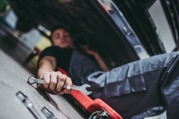 Handsome auto service mechanic