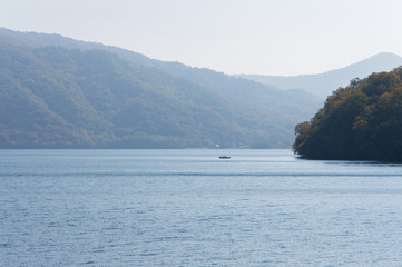 Scenic view of lake Towada with small islands, Aomori, Oirase Gorge, Japan