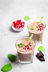 Chocolate pomegranate smoothie. Toip view, copy space. Selective focus, space for text.