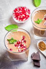 Hot chocolate pomegranate breakfast smoothie. Toip view, close up.