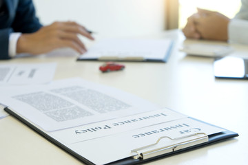 Yound Business man insurance agent and customer