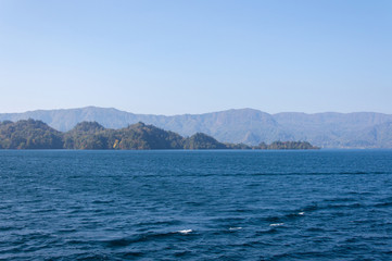 Scenic view of lake Towada with small islands, Aomori, Oirase Gorge, Japan