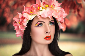 Beautiful Girl in a Flower Wreath