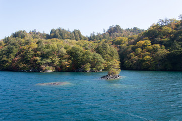 Scenic view of lake Towada with small islands, Aomori, Oirase Gorge, Japan