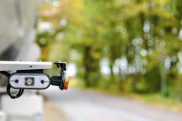 Picture of the yellow turn signal of a large caravan